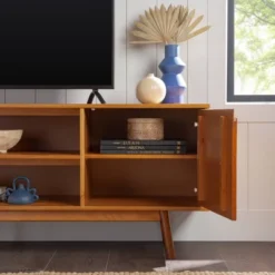 Solid Wood Mid-Century Modern TV Stand For TVs Up To 80" - Saracina Home 26 Solid Wood Mid-Century Modern TV Stand For TVs Up To 80" - Saracina Home -Baxton Studio Sale Shop GUEST 718deacd a6aa 48d3 a2de dc60399694ef